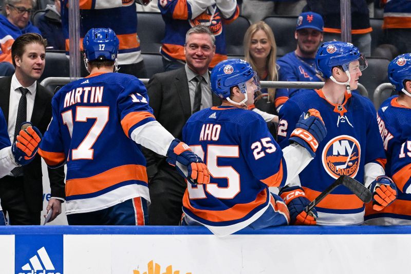 Apr 17, 2024; Elmont, New York, USA;  New York Islanders head coach Patrick Roy during the third period against the Pittsburgh Penguins at UBS Arena. Mandatory Credit: Dennis Schneidler-USA TODAY Sports