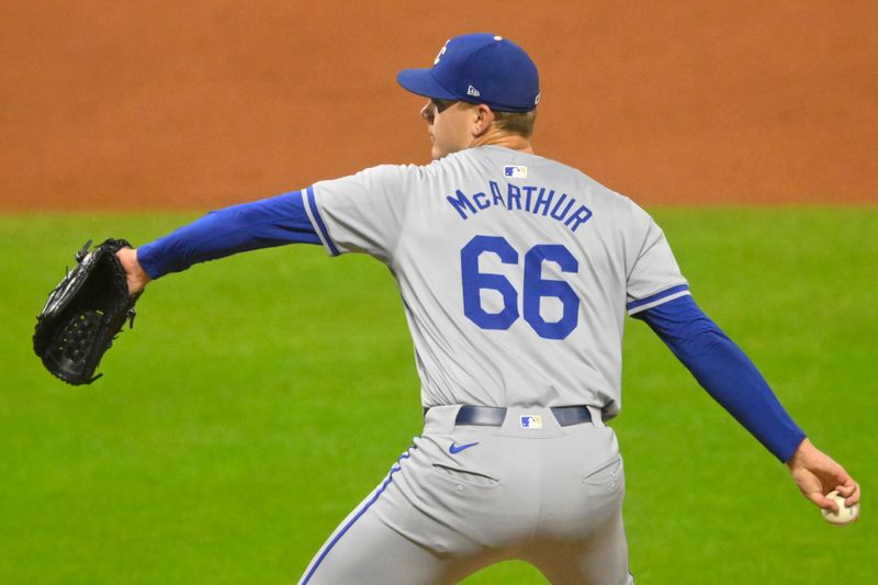 Aug 27, 2024; Cleveland, Ohio, USA; Kansas City Royals relief pitcher James McArthur (66) delivers a pitch in the fifth inning against the Cleveland Guardians at Progressive Field. Mandatory Credit: David Richard-USA TODAY Sports