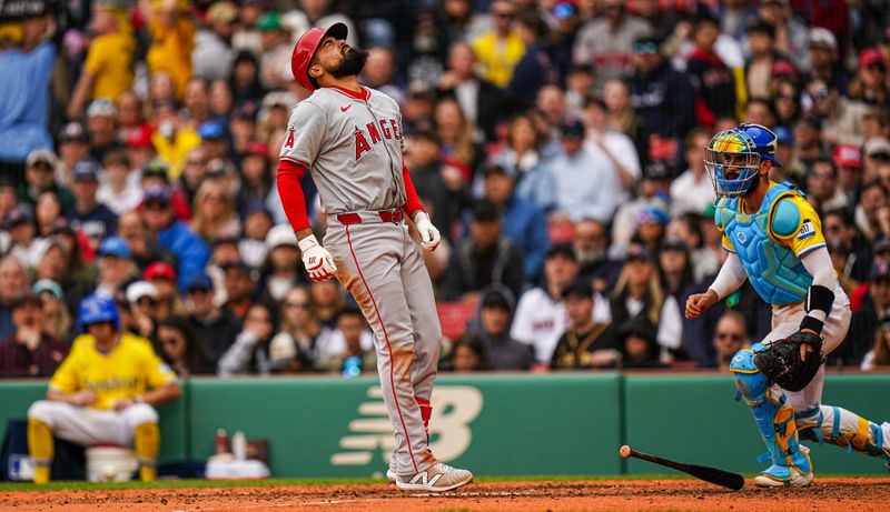 Apr 14, 2024; Boston, Massachusetts, USA; Los Angeles Angels third baseman Anthony Rendon (6) is hit by a pitch by the Boston Red Sox in the seventh inning at Fenway Park. Mandatory Credit: David Butler II-USA TODAY Sports