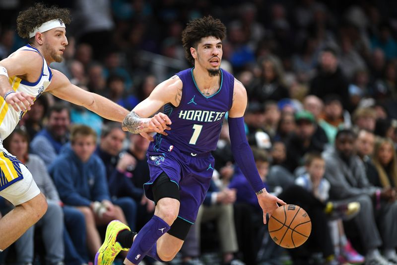CHARLOTTE, NC - MARCH 3: LaMelo Ball #1 of the Charlotte Hornets handles the ball during the game against the Golden State Warriors on March 3, 2025 at Spectrum Center in Charlotte, North Carolina. NOTE TO USER: User expressly acknowledges and agrees that, by downloading and or using this photograph, User is consenting to the terms and conditions of the Getty Images License Agreement. Mandatory Copyright Notice: Copyright 2025 NBAE (Photo by Erin Mizelle/NBAE via Getty Images)