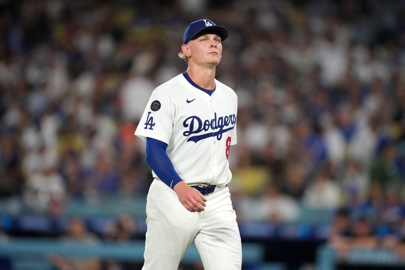 Sep 9, 2025; Los Angeles, California, USA; Los Angeles Dodgers starting pitcher Emmet Sheehan (80) reacts at the end of the seventh inning against the Colorado Rockies at Dodger Stadium. Mandatory Credit: Kirby Lee-Imagn Images
