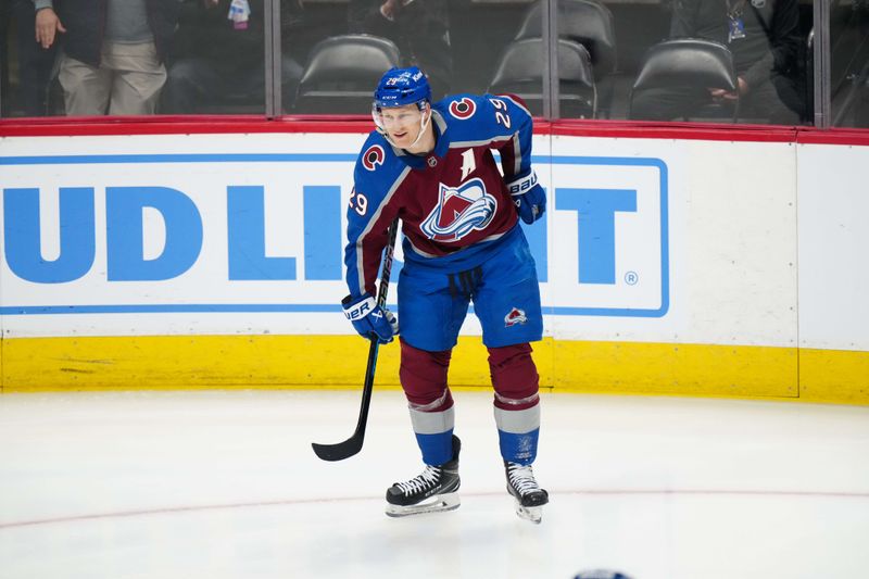 Mar 26, 2024; Denver, Colorado, USA; Colorado Avalanche center Nathan MacKinnon (29) celebrates his goal in the first period at Ball Arena. Mandatory Credit: Ron Chenoy-USA TODAY Sports