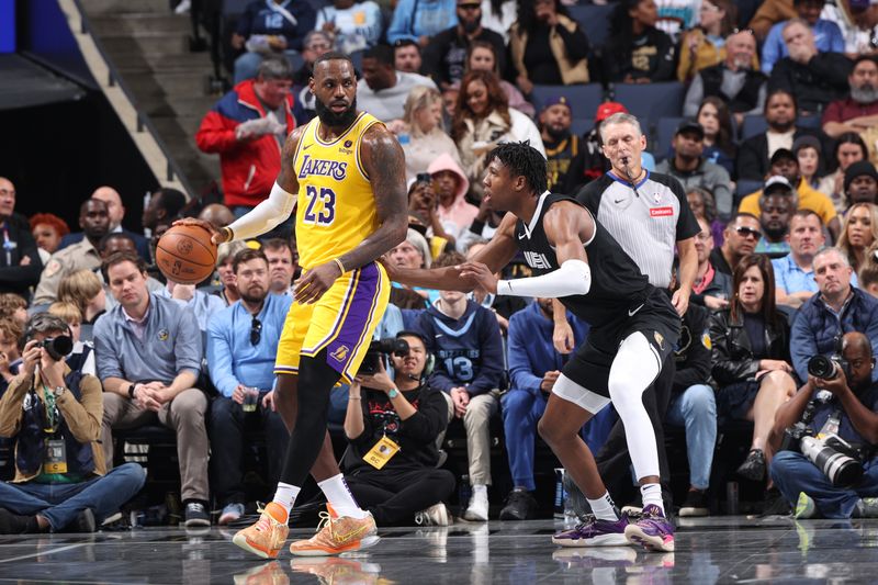 MEMPHIS, TN - MARCH 27: LeBron James #23 of the Los Angeles Lakers handles the ball during the game against the Memphis Grizzlies on March 27, 2024 at FedExForum in Memphis, Tennessee. NOTE TO USER: User expressly acknowledges and agrees that, by downloading and or using this photograph, User is consenting to the terms and conditions of the Getty Images License Agreement. Mandatory Copyright Notice: Copyright 2024 NBAE (Photo by Joe Murphy/NBAE via Getty Images)