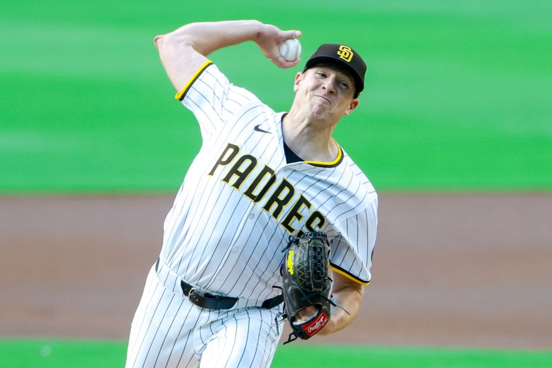 Jun 9, 2025; San Diego, California, USA; San Diego Padres starting pitcher Nick Pivetta (27) throws a pitch during the first inning against the Los Angeles Dodgers at Petco Park. Mandatory Credit: David Frerker-Imagn Images