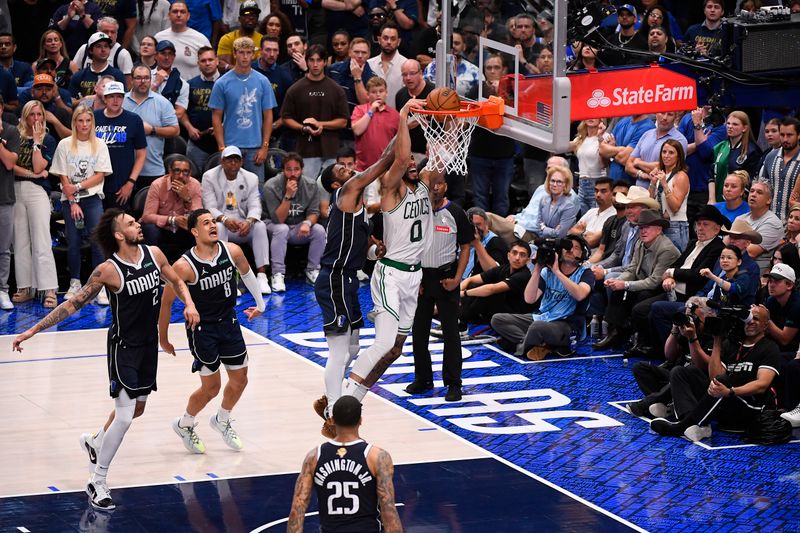 DALLAS, TX - JUNE 12: Jayson Tatum #0 of the Boston Celtics dunks the ball during the game against the Dallas Mavericks during Game 3 of the 2024 NBA Finals on June 12, 2024 at the American Airlines Center in Dallas, Texas. NOTE TO USER: User expressly acknowledges and agrees that, by downloading and or using this photograph, User is consenting to the terms and conditions of the Getty Images License Agreement. Mandatory Copyright Notice: Copyright 2024 NBAE (Photo by Brian Babineau/NBAE via Getty Images)