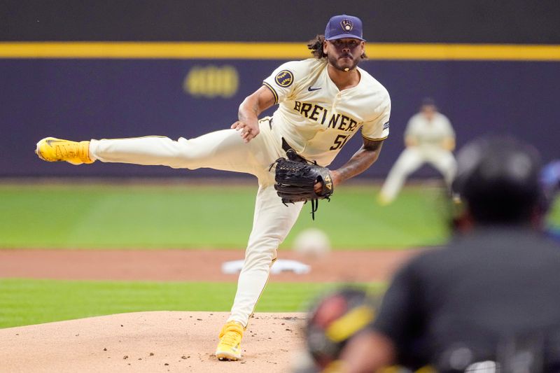 May 28, 2024; Milwaukee, Wisconsin, USA;  Milwaukee Brewers pitcher Freddy Peralta (51) throws a pitch during the first inning against the Chicago Cubs at American Family Field. Mandatory Credit: Jeff Hanisch-USA TODAY Sports