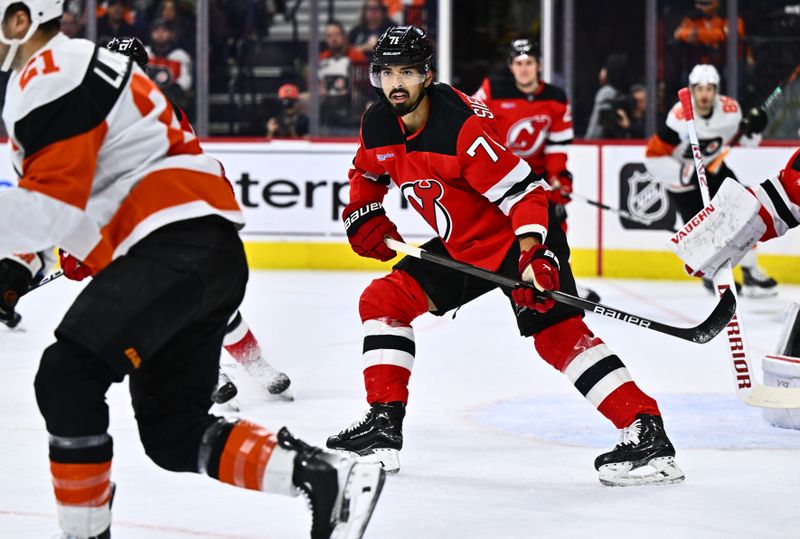 Apr 13, 2024; Philadelphia, Pennsylvania, USA; New Jersey Devils defenseman Jonas Siegenthaler (71) in action against the Philadelphia Flyers in the first period at Wells Fargo Center. Mandatory Credit: Kyle Ross-USA TODAY Sports