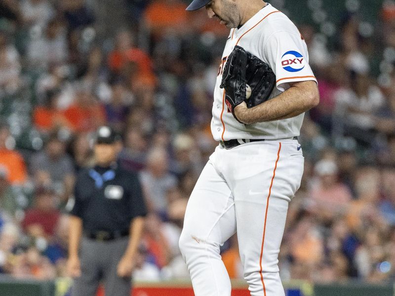 Sep 12, 2023; Houston, Texas, USA; Houston Astros starting pitcher Justin Verlander (35) kicks the mound after giving up a RBI against the Oakland Athletics in the first inning at Minute Maid Park. Mandatory Credit: Thomas Shea-USA TODAY Sports