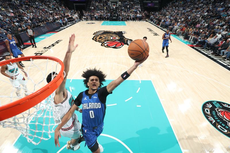 MEMPHIS, TN - OCTOBER 26: Anthony Black #0 of the Orlando Magic drives to the basket during the game against the Memphis Grizzlies on October 26, 2024 at FedExForum in Memphis, Tennessee. NOTE TO USER: User expressly acknowledges and agrees that, by downloading and or using this photograph, User is consenting to the terms and conditions of the Getty Images License Agreement. Mandatory Copyright Notice: Copyright 2024 NBAE (Photo by Joe Murphy/NBAE via Getty Images)