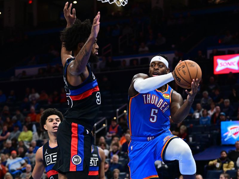 OKLAHOMA CITY, OKLAHOMA - OCTOBER 30: Luguentz Dort #5 of the Oklahoma City Thunder looks to pass the ball against the Detroit Pistons at Paycom Center on October 30, 2023 in Oklahoma City, Oklahoma. NOTE TO USER: User expressly acknowledges and agrees that, by downloading and or using this photograph, User is consenting to the terms and conditions of the Getty Images License Agreement. (Photo by Joshua Gateley/Getty Images)