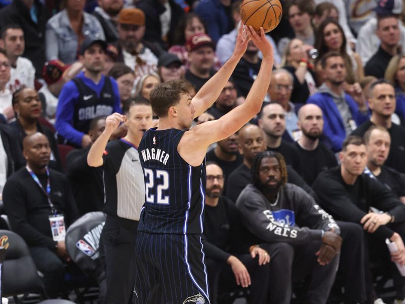 CLEVELAND, OH - APRIL 20: Franz Wagner #22 of the Orlando Magic shoots the ball during Round One Game One of the 2024 NBA Playoffs against the Cleveland Cavaliers on April 20, 2024 at Rocket Mortgage FieldHouse in Cleveland, Ohio. NOTE TO USER: User expressly acknowledges and agrees that, by downloading and/or using this Photograph, user is consenting to the terms and conditions of the Getty Images License Agreement. Mandatory Copyright Notice: Copyright 2024 NBAE (Photo by  Lauren Leigh Bacho/NBAE via Getty Images)