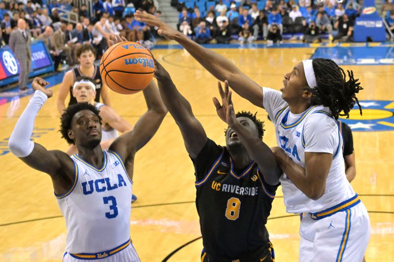 Dec 23, 2025; Los Angeles, California, USA; UCLA Bruins forward Eric Dailey Jr. (3) and center Steven Jamerson II (24) defend a shot by UC Riverside Highlanders forward BJ Kolly (8) in the second half at Pauley Pavilion presented by Wescom Financial. Mandatory Credit: Jayne Kamin-Oncea-Imagn Images