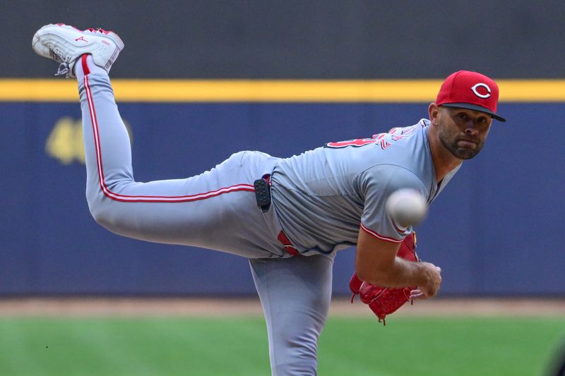 Aug 10, 2024; Milwaukee, Wisconsin, USA; Cincinnati Reds starting pitcher Nick Martinez (28) pitches against the Milwaukee Brewers in the first inning at American Family Field. Mandatory Credit: Benny Sieu-USA TODAY Sports