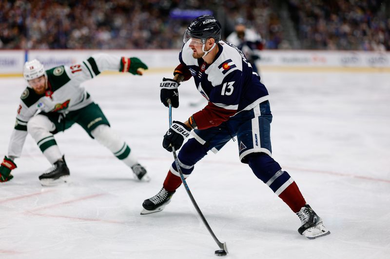 Mar 8, 2026; Denver, Colorado, USA; Colorado Avalanche right wing Valeri Nichushkin (13) attempts a shot in the second period against the Minnesota Wild at Ball Arena. Mandatory Credit: Isaiah J. Downing-Imagn Images