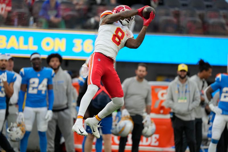 Kansas City Chiefs wide receiver Justyn Ross makes a catch during the first half of an NFL football game against the Los Angeles Chargers, Sunday, Jan. 7, 2024, in Inglewood, Calif. (AP Photo/Ashley Landis)