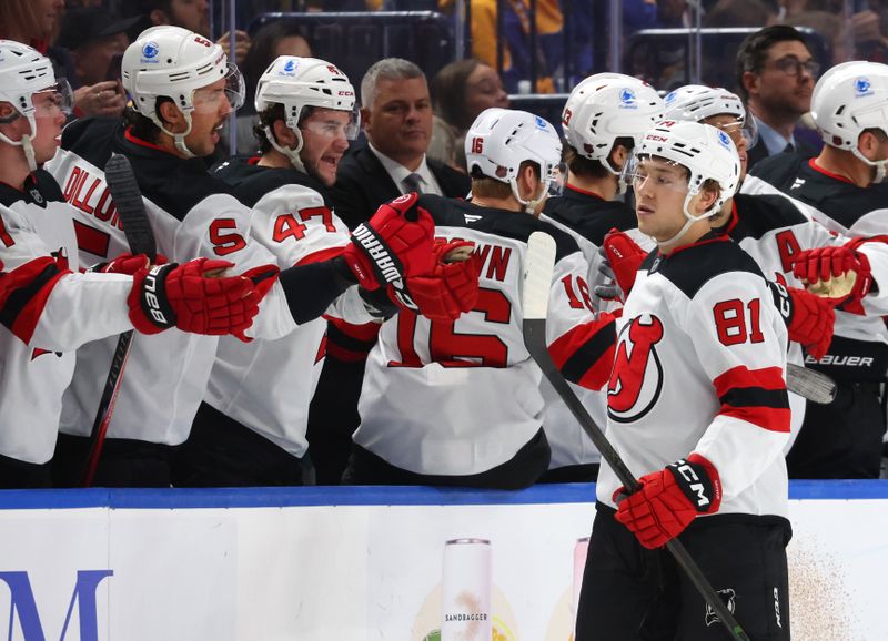 Nov 28, 2025; Buffalo, New York, USA;  New Jersey Devils right wing Arseny Gritsyuk (81) celebrates his goal with teammates during the second period against the Buffalo Sabres at KeyBank Center. Mandatory Credit: Timothy T. Ludwig-Imagn Images