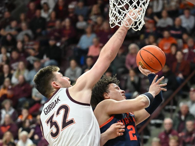 Dec 31, 2025; Blacksburg, Virginia, USA;   Virginia Cavaliers guard Chance Mallory (2) goes up for a shot as Virginia Tech Hokies center Christian Gurdak (32) defends during the second half at Cassell Coliseum. Mandatory Credit: Brian Bishop-Imagn Images