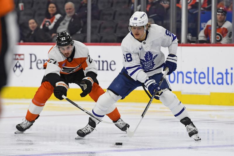 Jan 7, 2025; Philadelphia, Pennsylvania, USA; Toronto Maple Leafs right wing William Nylander (88) controls the puck against Philadelphia Flyers left wing Noah Cates (27) during the second period at Wells Fargo Center. Mandatory Credit: Eric Hartline-Imagn Images