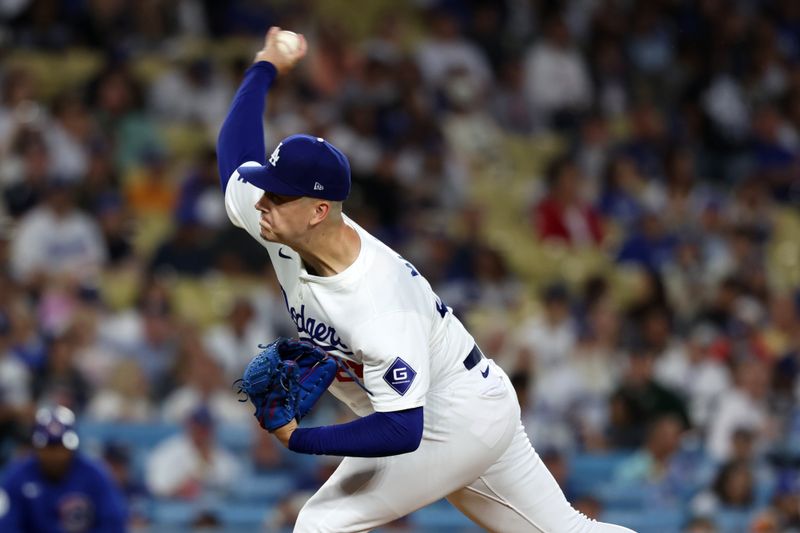 Sep 11, 2024; Los Angeles, California, USA;  Los Angeles Dodgers starting pitcher Bobby Miller (28) pitches during the first inning against the Chicago Cubs at Dodger Stadium. Mandatory Credit: Kiyoshi Mio-Imagn Images