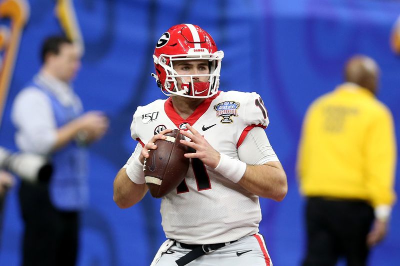 Jan 1, 2020; New Orleans, Louisiana, USA; Georgia Bulldogs quarterback Jake Fromm (11) warms up before his team plays the Baylor Bears in the Sugar Bowl at the Mercedes-Benz Superdome. Mandatory Credit: Chuck Cook-USA TODAY Sports