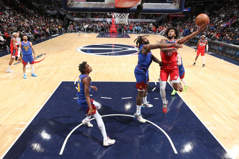 WASHINGTON, DC -? JANUARY 21:  Marvin Bagley III #35 of the Washington Wizards goes to the basket during the game on January 21, 2024 at Capital One Arena in Washington, DC. NOTE TO USER: User expressly acknowledges and agrees that, by downloading and or using this Photograph, user is consenting to the terms and conditions of the Getty Images License Agreement. Mandatory Copyright Notice: Copyright 2024 NBAE (Photo by Stephen Gosling/NBAE via Getty Images)