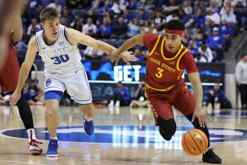 Jan 16, 2024; Provo, Utah, USA; Iowa State Cyclones guard Tamin Lipsey (3) drives with the ball defended by Brigham Young Cougars guard Dallin Hall (30) during the second half at Marriott Center. Mandatory Credit: Rob Gray-USA TODAY Sports