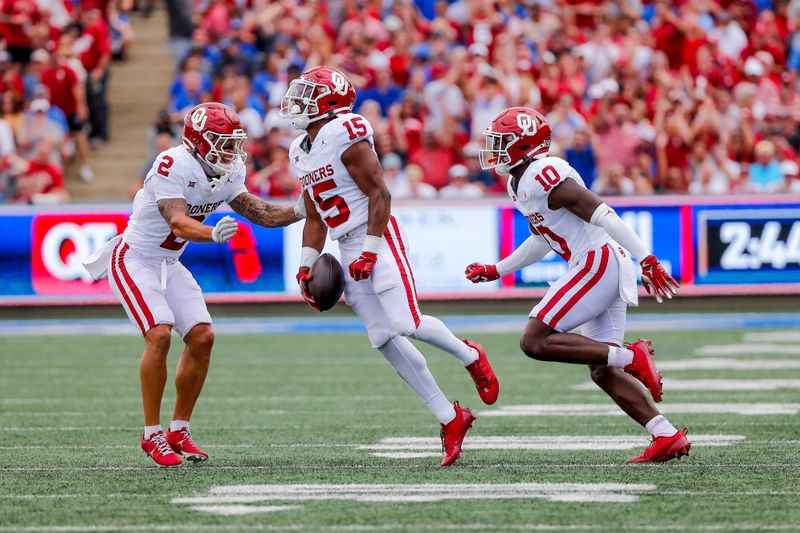 Sep 16, 2023; Tulsa, Oklahoma, USA; Oklahoma s Kendel Dolby (15) celebrates after intercepting the ball in the first quarter  against the Tulsa Golden Hurricane at Skelly Field at H.A. Chapman Stadium. Mandatory Credit: Nathan J. Fish-USA TODAY Sports