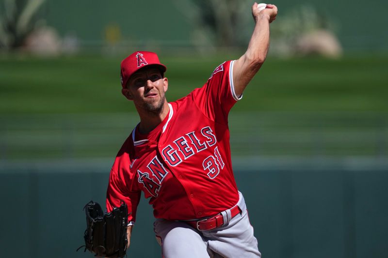 Mar 4, 2024; Surprise, Arizona, USA; Los Angeles Angels pitcher Tyler Anderson pitches against the Texas Rangers during the first inning at Surprise Stadium. Mandatory Credit: Joe Camporeale-USA TODAY Sports