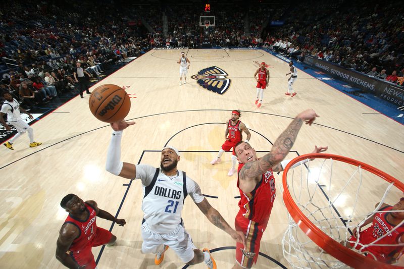 NEW ORLEANS, LA - JANUARY 29: Daniel Gafford #21 of the Dallas Mavericks rebounds the ball during the game against the New Orleans Pelicans on January 29, 2025 at the Smoothie King Center in New Orleans, Louisiana. NOTE TO USER: User expressly acknowledges and agrees that, by downloading and or using this Photograph, user is consenting to the terms and conditions of the Getty Images License Agreement. Mandatory Copyright Notice: Copyright 2025 NBAE (Photo by Layne Murdoch Jr./NBAE via Getty Images)