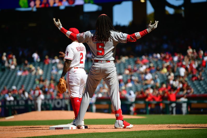 Jun 29, 2025; Anaheim, California, USA; Washington Nationals shortstop CJ Abrams (5) reacts after reaching third on a two run RBI triple against the Los Angeles Angels during the eleventh inning at Angel Stadium. Mandatory Credit: Gary A. Vasquez-Imagn Images