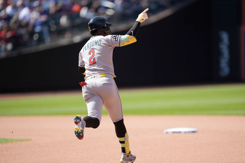 May 1, 2025; New York City, New York, USA; Arizona Diamondbacks shortstop Geraldo Perdomo (2) reacts to hitting a home run against the New York Mets during the seventh inning at Citi Field. Mandatory Credit: Gregory Fisher-Imagn Images