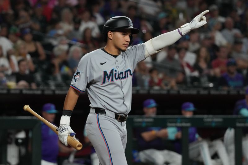 Jun 27, 2025; Phoenix, Arizona, USA; Miami Marlins second base Javier Sanoja (46) reacts to a violation against the Arizona Diamondbacks in the fifth inning at Chase Field. Mandatory Credit: Rick Scuteri-Imagn Images