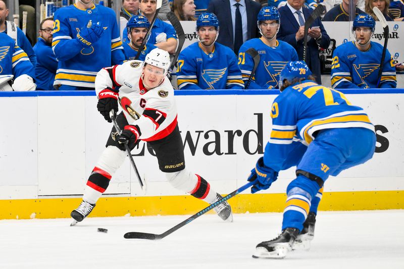 Nov 28, 2025; St. Louis, Missouri, USA; Ottawa Senators left wing Brady Tkachuk (7) controls the puck as St. Louis Blues defenseman Matthew Kessel (51) defends during the first period at Enterprise Center. Mandatory Credit: Jeff Curry-Imagn Images