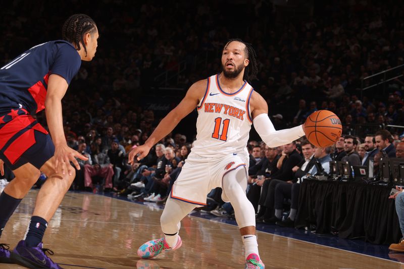 NEW YORK, NY - NOVEMBER 18: Jalen Brunson #11 of the New York Knicks passes the ball during the game against the Washington Wizards on November 18, 2024 at Madison Square Garden in New York City, New York.  NOTE TO USER: User expressly acknowledges and agrees that, by downloading and or using this photograph, User is consenting to the terms and conditions of the Getty Images License Agreement. Mandatory Copyright Notice: Copyright 2024 NBAE  (Photo by Nathaniel S. Butler/NBAE via Getty Images)
