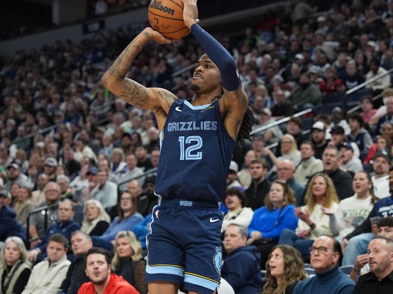 MINNEAPOLIS, MN -  JANUARY 11: Ja Morant #12 of the Memphis Grizzlies shoots a three point basket during the game against the Minnesota Timberwolves on January 11, 2025 at Target Center in Minneapolis, Minnesota. NOTE TO USER: User expressly acknowledges and agrees that, by downloading and or using this Photograph, user is consenting to the terms and conditions of the Getty Images License Agreement. Mandatory Copyright Notice: Copyright 2025 NBAE (Photo by Jordan Johnson/NBAE via Getty Images)