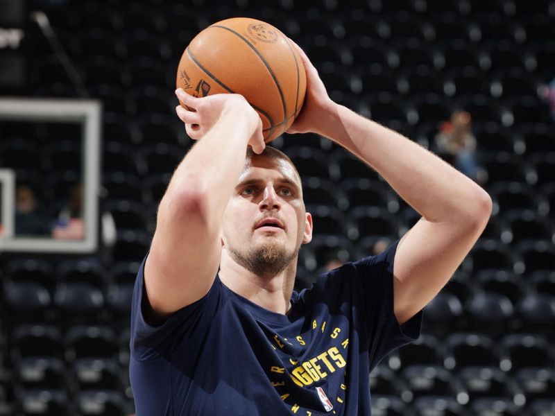 SALT LAKE CITY, UT - WEDNESDAY 27: Nikola Jokic #15 of the Denver Nuggets warms up before the game against the Utah Jazz on Wednesday 27, 2024 at vivint.SmartHome Arena in Salt Lake City, Utah. NOTE TO USER: User expressly acknowledges and agrees that, by downloading and or using this Photograph, User is consenting to the terms and conditions of the Getty Images License Agreement. Mandatory Copyright Notice: Copyright 2024 NBAE (Photo by Melissa Majchrzak/NBAE via Getty Images)