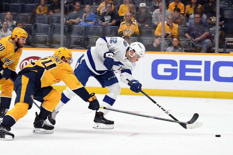 Sep 27, 2023; Nashville, Tennessee, USA; Tampa Bay Lightning forward Maxim Groshev (52) scores during the second period against the Nashville Predators at Bridgestone Arena. Mandatory Credit: Christopher Hanewinckel-USA TODAY Sports