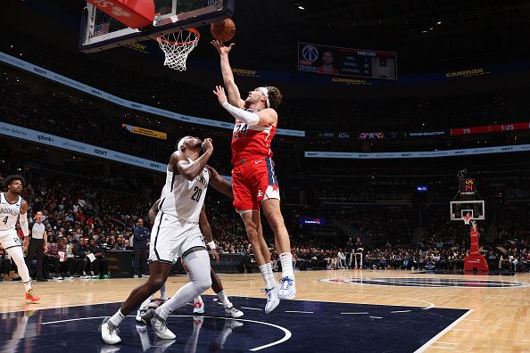 WASHINGTON, DC -? DECEMBER 29: Corey Kispert #24 of the Washington Wizards drives to the basket during the game against the Brooklyn Nets on December 29, 2023 at Capital One Arena in Washington, DC. NOTE TO USER: User expressly acknowledges and agrees that, by downloading and or using this Photograph, user is consenting to the terms and conditions of the Getty Images License Agreement. Mandatory Copyright Notice: Copyright 2023 NBAE (Photo by Stephen Gosling/NBAE via Getty Images)