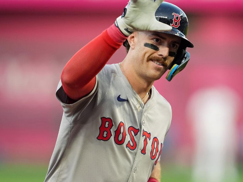 Aug 7, 2024; Kansas City, Missouri, USA; Boston Red Sox second baseman Romy Gonzalez (23) gestures to the dugout after hitting a home run during the third inning against the Kansas City Royals at Kauffman Stadium. Mandatory Credit: Jay Biggerstaff-USA TODAY Sports