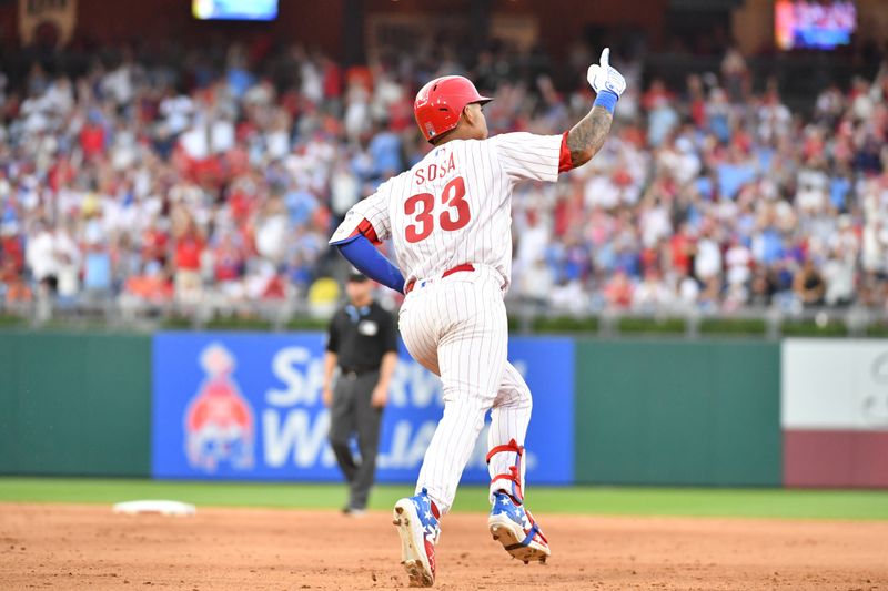 Jul 26, 2023; Philadelphia, Pennsylvania, USA; Philadelphia Phillies third baseman Edmundo Sosa (33) celebrates his home run against the Baltimore Orioles during the seventh inning at Citizens Bank Park. Mandatory Credit: Eric Hartline-USA TODAY Sports