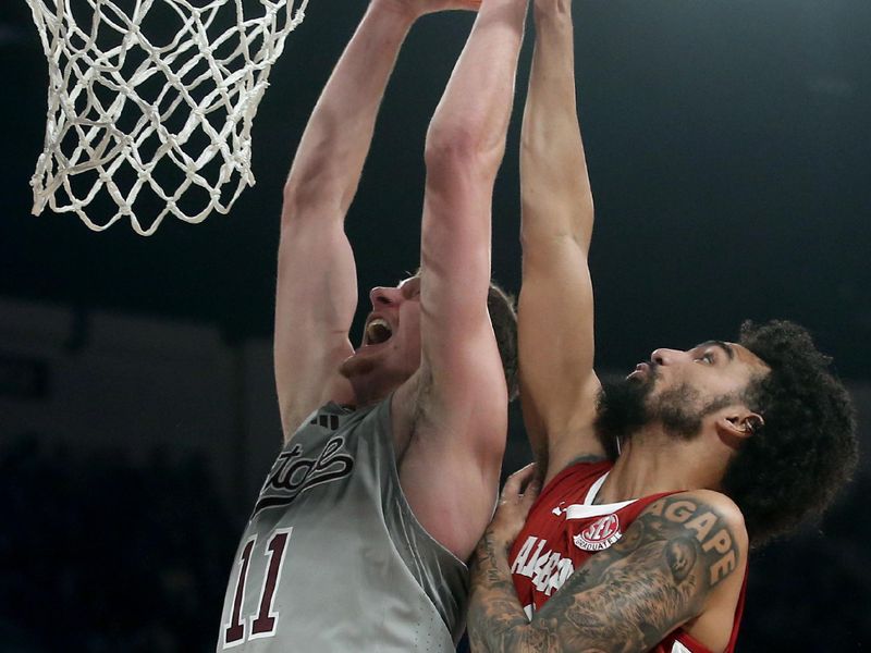 Jan 13, 2026; Starkville, Mississippi, USA; Mississippi State Bulldogs forward Sergej Macura (11) drives to the basket as Alabama Crimson Tide guard Houston Mallette (95) defends during the first half at Humphrey Coliseum. Mandatory Credit: Petre Thomas-Imagn Images