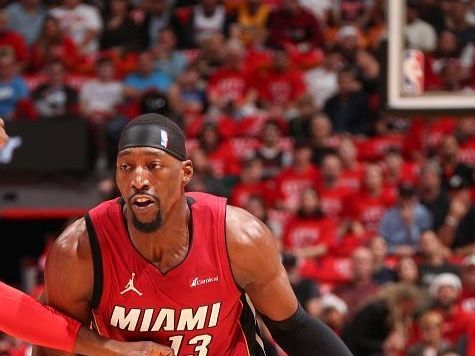 MIAMI, FL - DECEMBER 25:  Bam Adebayo #13 of the Miami Heat handles the ball during the game  on December 25, 2023 at Kaseya Center Arena in Miami, Florida. NOTE TO USER: User expressly acknowledges and agrees that, by downloading and or using this Photograph, user is consenting to the terms and conditions of the Getty Images License Agreement. Mandatory Copyright Notice: Copyright 2023 NBAE (Photo by Issac Baldizon/NBAE via Getty Images)