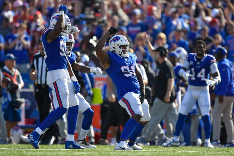 Buffalo Bills defensive tackle Ed Oliver (91) celebrates during the second half of an NFL football game against the Miami Dolphins in Orchard Park, N.Y., Sunday, Oct. 1, 2023. (AP Photo/Adrian Kraus)