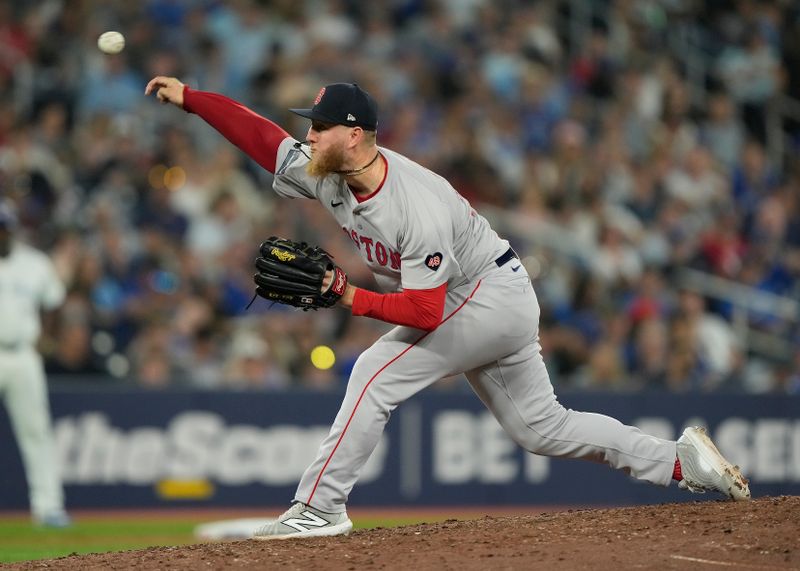 Jun 18, 2024; Toronto, Ontario, CAN; Boston Red Sox pitcher Zack Kelly (76) pitches to the Toronto Blue Jays during the seventh inning at Rogers Centre. Mandatory Credit: John E. Sokolowski-USA TODAY Sports