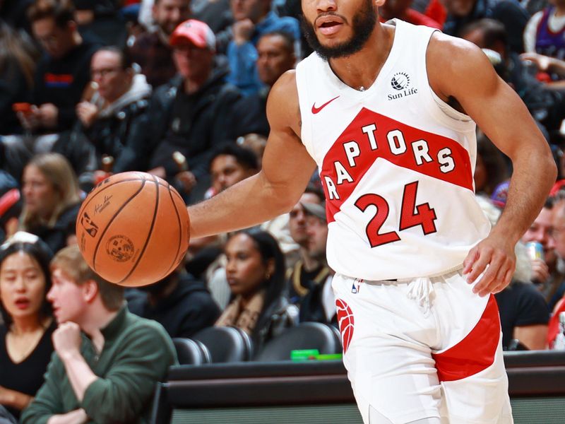 TORONTO, CANADA - OCTOBER 15: Markquis Nowell #24 of the Toronto Raptors dribbles the ball during the game against the Cairns Taipans on October 15, 2023 at the Scotiabank Arena in Toronto, Ontario, Canada.  NOTE TO USER: User expressly acknowledges and agrees that, by downloading and or using this Photograph, user is consenting to the terms and conditions of the Getty Images License Agreement.  Mandatory Copyright Notice: Copyright 2023 NBAE (Photo by Vaughn Ridley/NBAE via Getty Images)