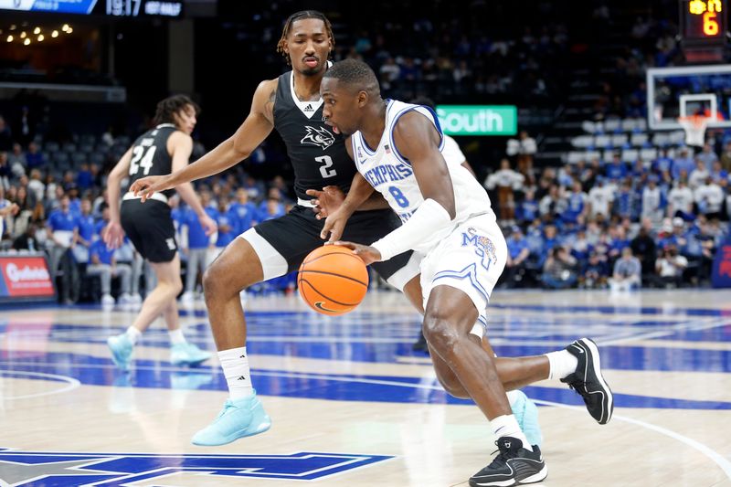 Jan 31, 2024; Memphis, Tennessee, USA; Memphis Tigers forward David Jones (8) drives to the basket as Rice Owls guard Mekhi Mason (2) defends during the first half at FedExForum. Mandatory Credit: Petre Thomas-USA TODAY Sports