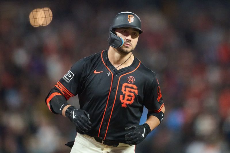 Aug 31, 2024; San Francisco, California, USA; San Francisco Giants outfielder Michael Conforto (8) runs the bases after hitting a one-run home run against the Miami Marlins during the eighth inning at Oracle Park. Mandatory Credit: Robert Edwards-USA TODAY Sports
