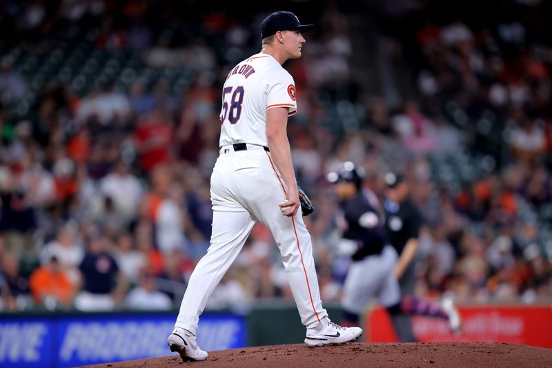 Apr 30, 2024; Houston, Texas, USA; Houston Astros starting pitcher Hunter Brown (58) reacts after giving up a three-run home run to Cleveland Guardians first base Josh Naylor (22, not shown) during the first inning at Minute Maid Park. Mandatory Credit: Erik Williams-USA TODAY Sports