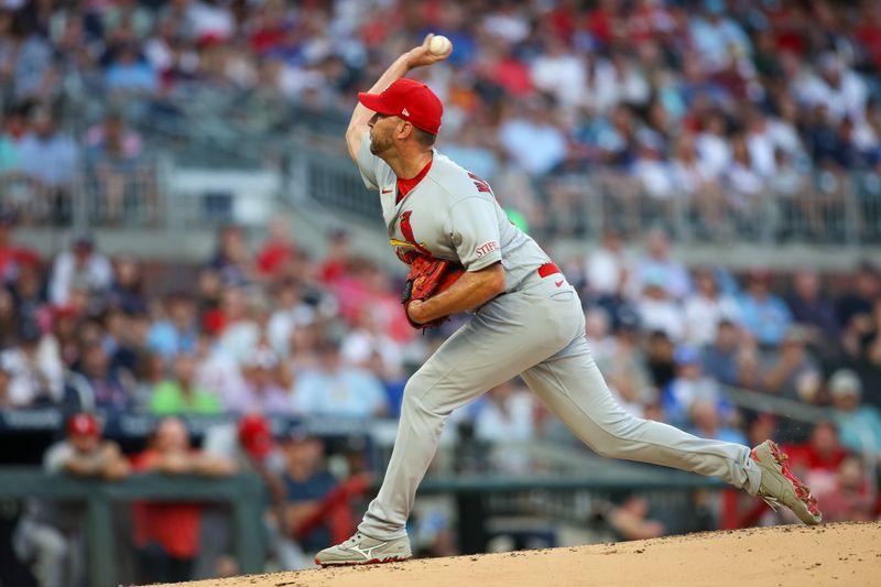 Sep 7, 2023; Atlanta, Georgia, USA; St. Louis Cardinals starting pitcher Adam Wainwright (50) throws against the Atlanta Braves in the first inning at Truist Park. Mandatory Credit: Brett Davis-USA TODAY Sports