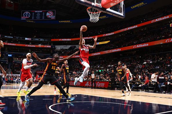 WASHINGTON, DC -? DECEMBER 31: Kyle Kuzma #33 of the Washington Wizards shoots the ball during the game against the Atlanta Hawks on December 31, 2023 at Capital One Arena in Washington, DC. NOTE TO USER: User expressly acknowledges and agrees that, by downloading and or using this Photograph, user is consenting to the terms and conditions of the Getty Images License Agreement. Mandatory Copyright Notice: Copyright 2023 NBAE (Photo by Kenny Giarla/NBAE via Getty Images)